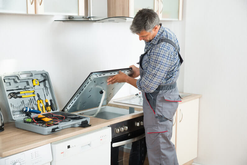 RightFix technician is fixing Stove in Winnipeg